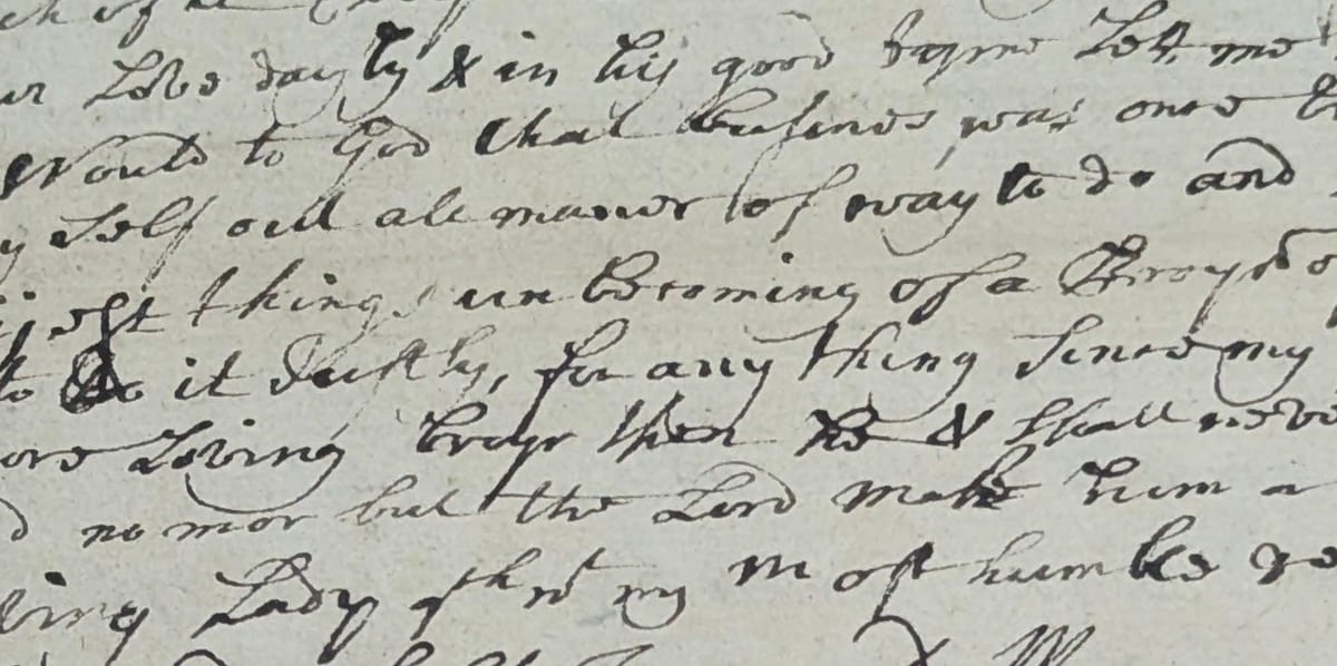 A clip from a letter written in the 18th Century in a looping italic hand, its content hard to read